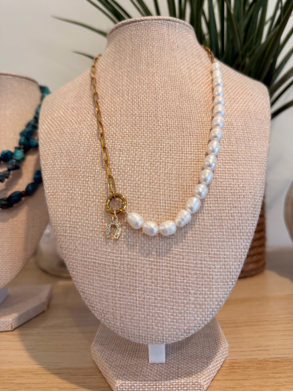 Gold Chain and White Pearl Half-Bead Necklace with horseshoe pendant